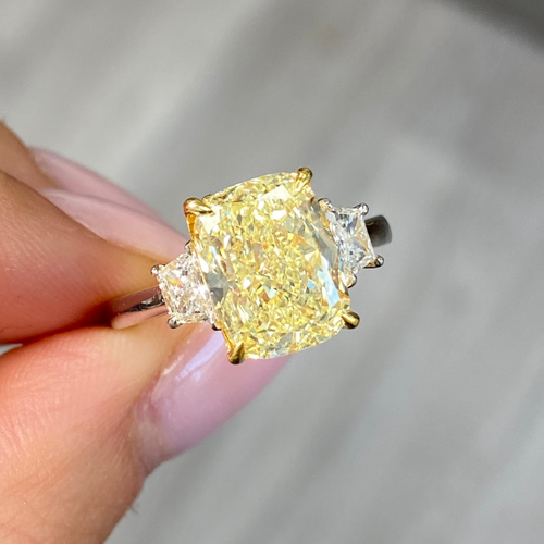 yellow diamond engagement ring with elongated cushion cut diamond