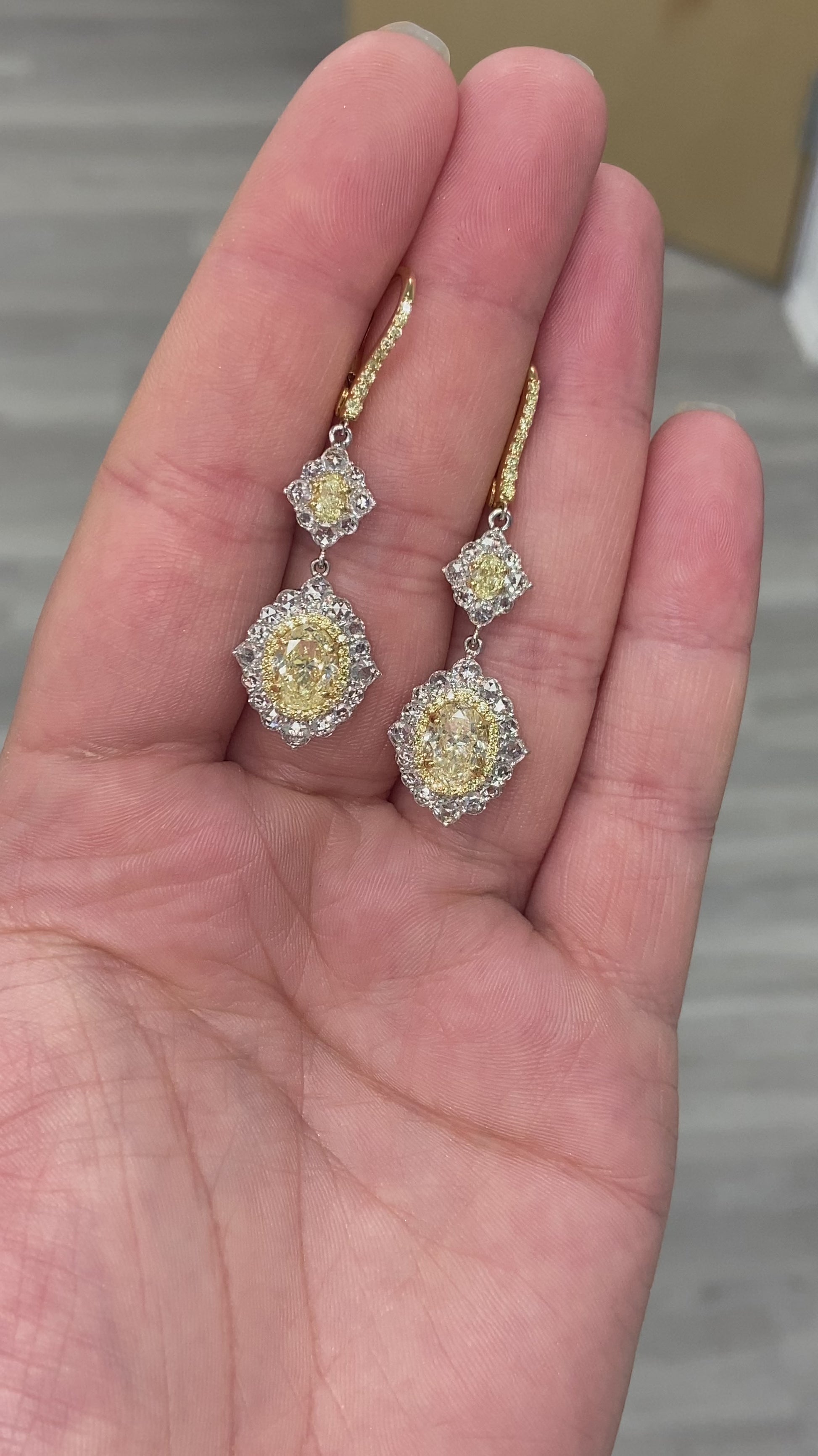 yellow diamond earring. yellow diamond. fancy yellow diamond. diamond earrings. yellow diamond halo earring.  canary diamond ring. yellow diamond jewelry. GIA certified yellow diamond.