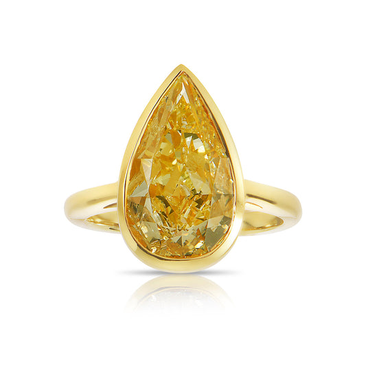 Bezel set diamond ring. Bezel engagement ring. 5 carat ring. Pear shape diamond ring