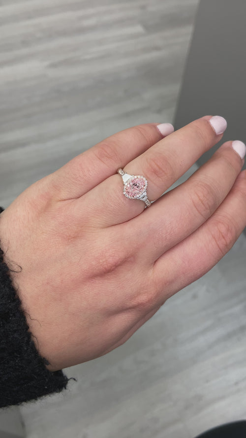 Pink diamond ring. pink diamond engagement ring. light pink diamonds. light pink oval diamond.  Unique engagement ring.