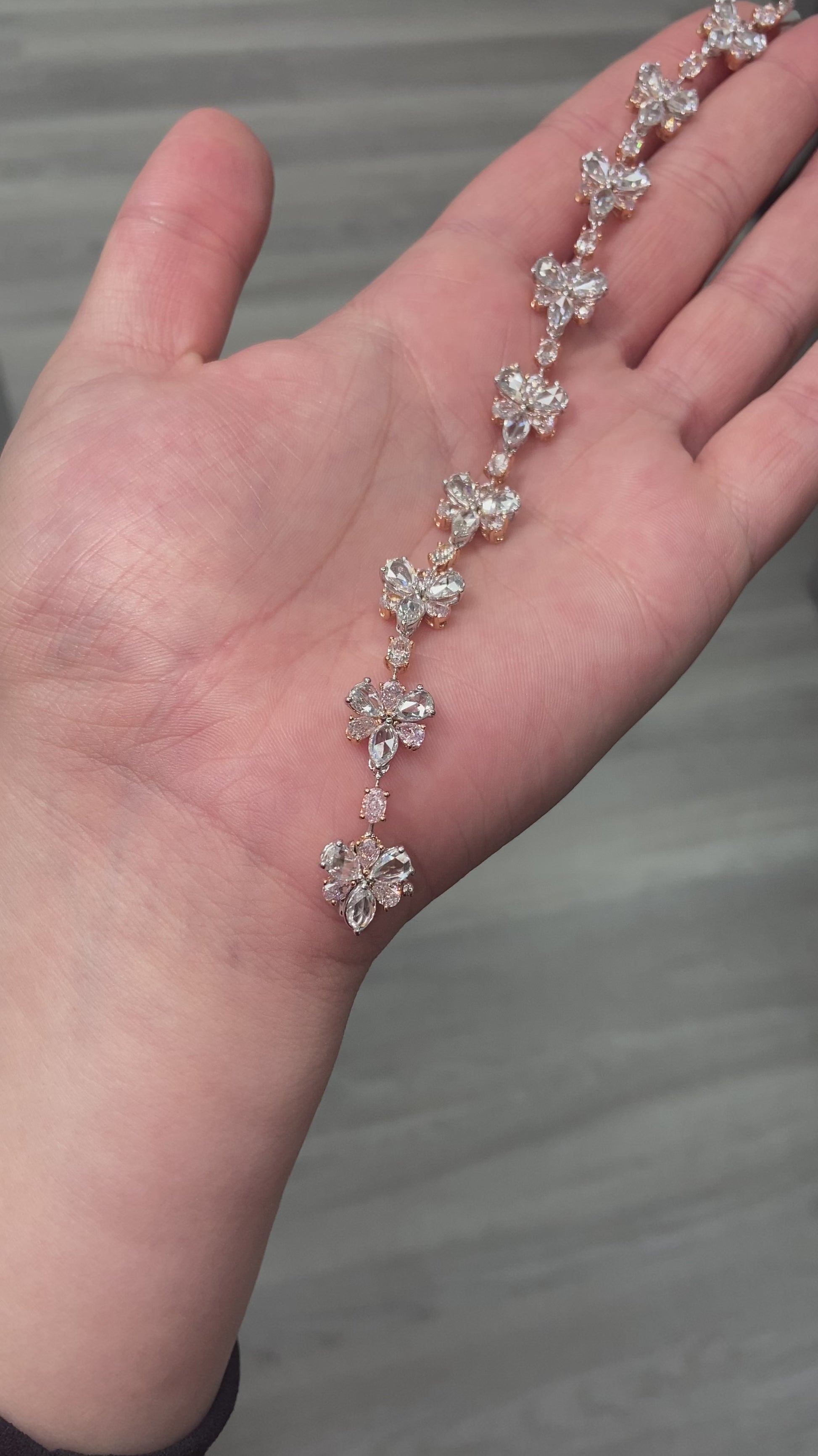 rare colors. pink diamond bracelet. pink floral bracelet. pink pear shape diamond. pink and white diamond bracelet. Natural pink diamond jewelry.