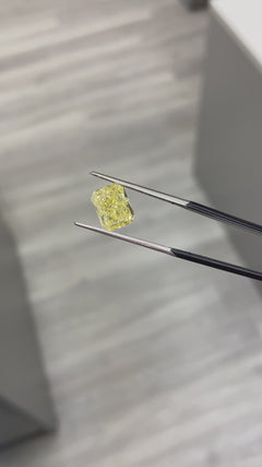 natural diamond. fancy colored diamond. yellow diamond. fancy intense yellow diamond. fancy intense yellow. fancy yellow diamond. yellow diamond radiant cut. radiant cut diamond.