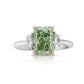 Elongated radiant cut green diamond ring