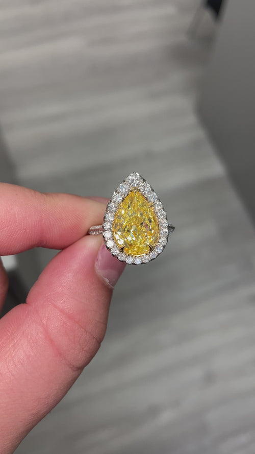 5 carat yellow diamond ring. Fancy intense yellow diamond ring. Yellow diamond radiant ring. Yellow diamond engagement ring. Canary yellow diamond ring.