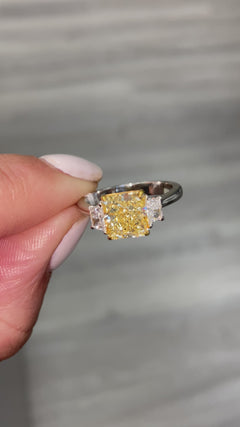 fancy yellow diamond ring. yellow diamonds. fancy yellow diamond. 3 stone ring. 2 carat yellow diamond.