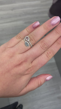 blue diamond. pink diamond. two stone ring. 2 stone ring. pink and blue pear shape diamond