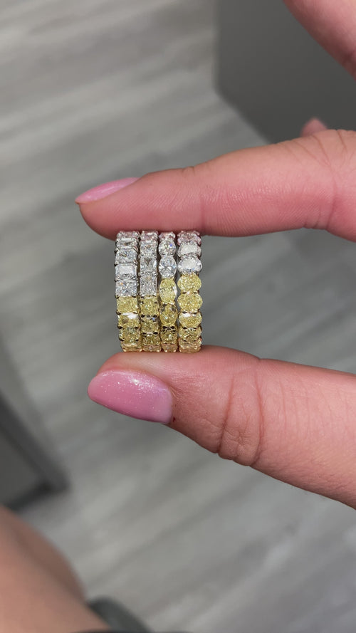 Wear two ways diamond eternity band. Undecided eternity ring. Diamond eternity ring. Fancy yellow and white alternating eternity band. Alternating diamond ring.