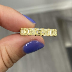 Fancy yellow diamond asscher cut eternity band.asscher cut diamonds. yellow asscher cut diamonds. Diamond eternity ring. Diamond wedding band. Yellow diamond jewelry. 
