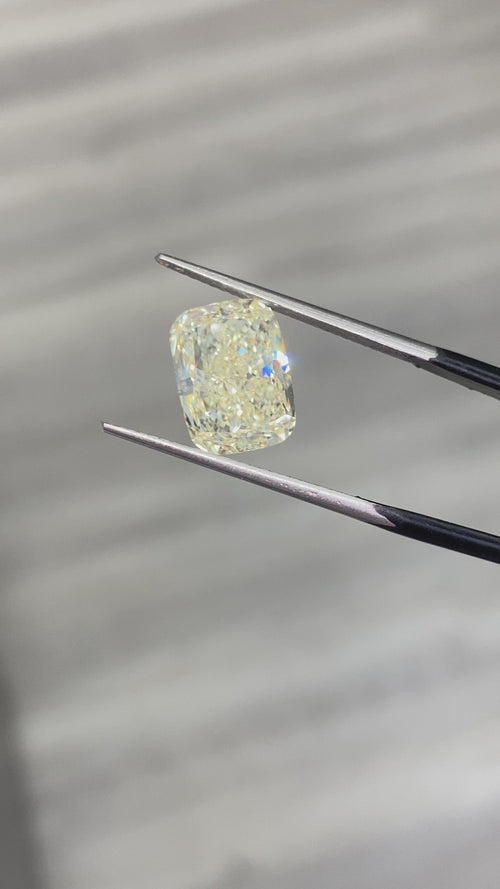 natural diamond. fancy colored diamond. yellow diamond. yellow heart diamond. fancy yellow diamond. yellow diamond cushion. cushion cut diamond. 