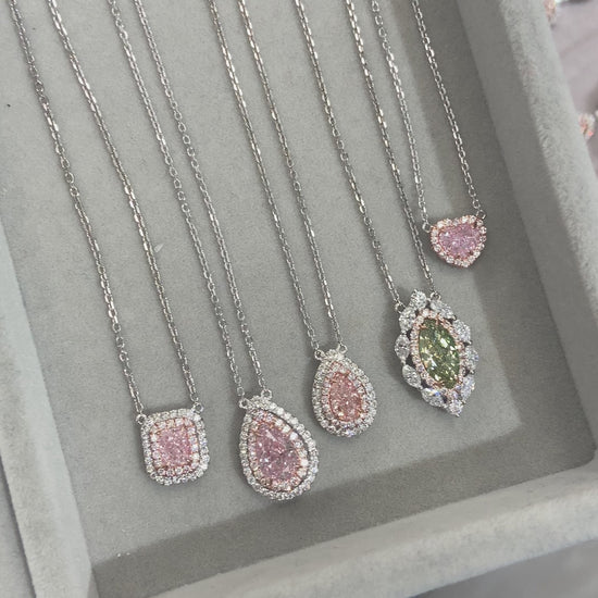 natural gren diamond. jlo green diamond. green diamond pendant. fancy colored diamond pendant.fancy colored diamond pendants.