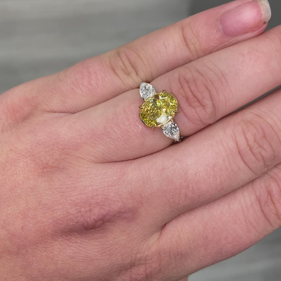 Intense oval diamond ring. Intense yellow diamond. Gia certified intense yellow diamond. Oval diamond ring. Yellow diamond engagement ring. Yellow diamond rings. Yellow diamond jewelry.