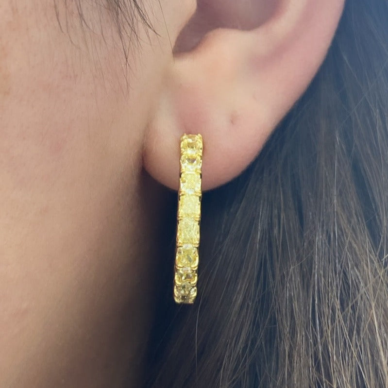 Yellow diamond hoops. Diamond hoop earrings. Yellow diamond earrings. Yellow diamond jewelry. Yellow diamond radiant cut.