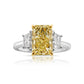 Elongated radiant cut yellow diamond ring