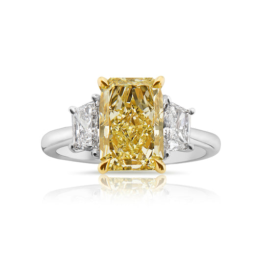 Elongated radiant cut yellow diamond ring