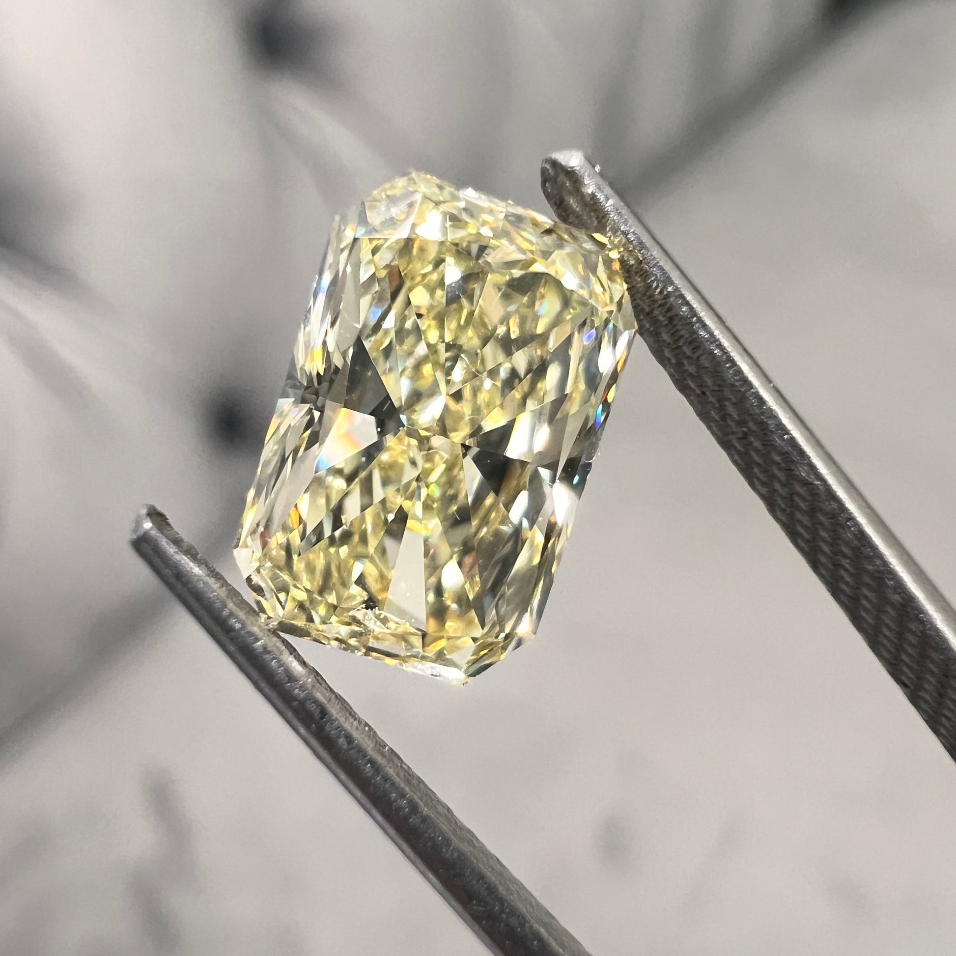 Elongated yellow diamond radiant cut. Long yellow diamond radiant cut. Long radiant diamond.