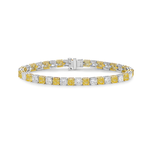 Yellow diamond bracelet. tennis bracelet. alternating diamond bracelet. yellow diamond cushions.