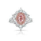 Fancy radiant pink elongated diamond ring. pink diamond oval. very light pink diamond.