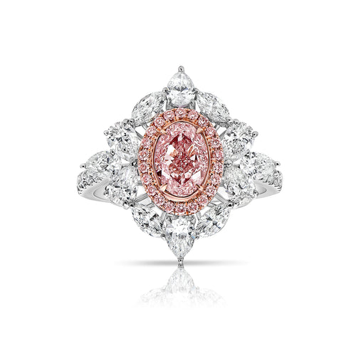 Fancy radiant pink elongated diamond ring. pink diamond oval. very light pink diamond.