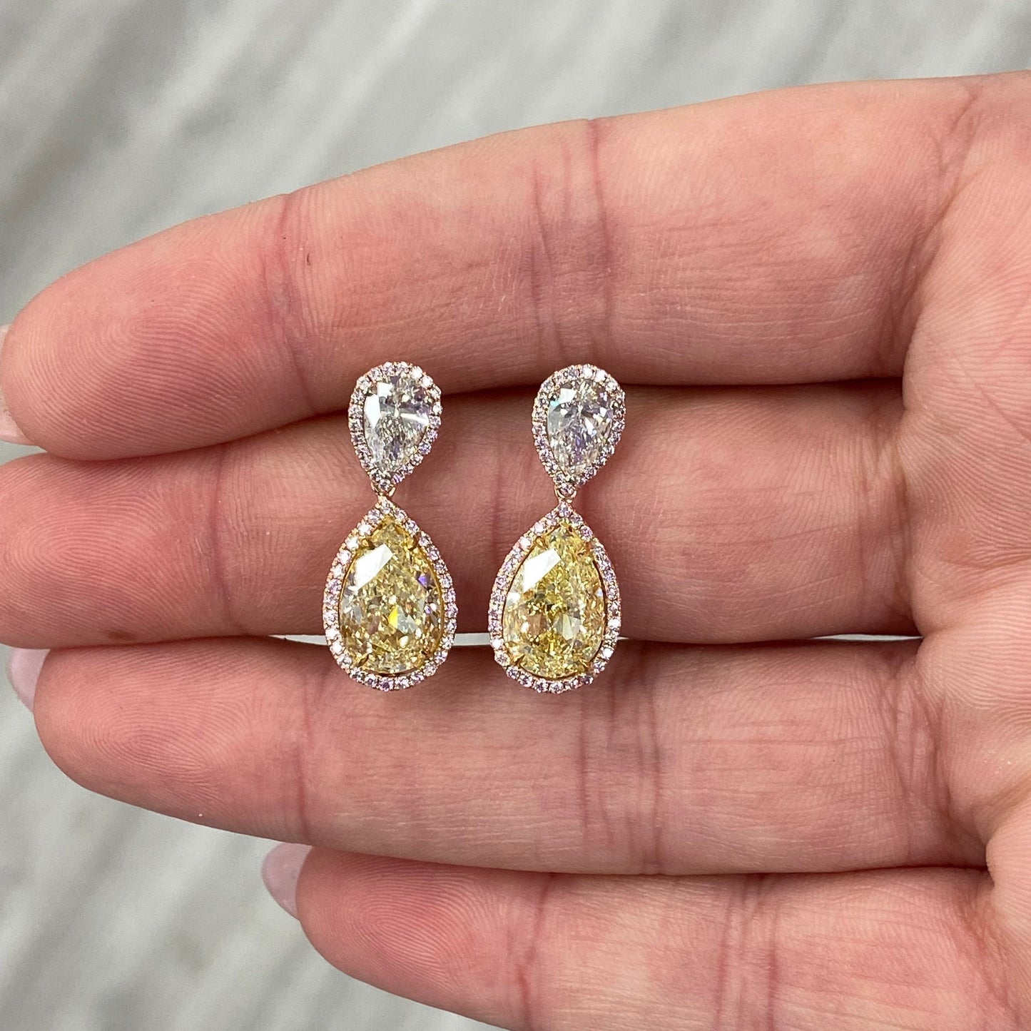 ar shape earrings.  yellow diamond drop earrings. diamond earrings.
