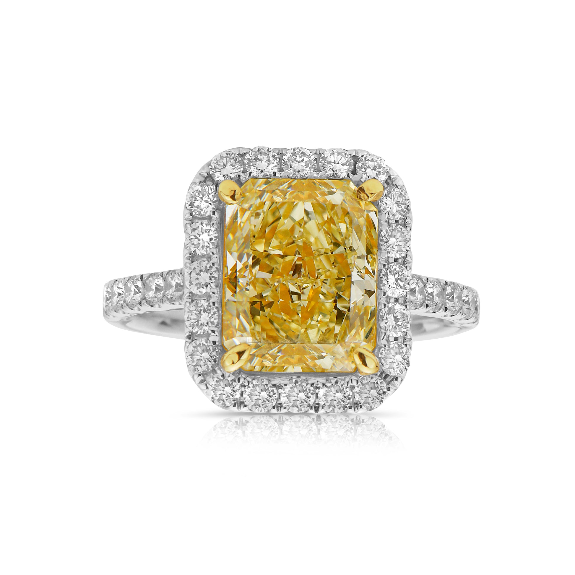 Halo diamond ring. Yellow halo diamond ring. Yellow diamond engagement ring. Light yellow diamond ring. Yellow diamond jewelry.