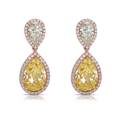 Fancy yellow diamond pear shape earrings.  yellow diamond drop earrings. diamond earrings.