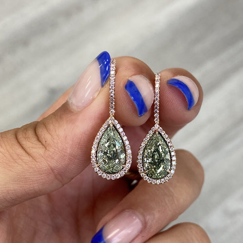 Royal natural green diamond earrings, GIA certified.