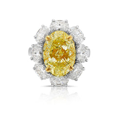 Fancy light yellow oval diamond. 7 carat yellow diamond oval shaped.