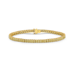 Fancy yellow diamond bracelet. Cushion diamond bracelet. Cushion tennis bracelet. Yellow diamond jewelry. Yellow tennis bracelet. Natural yellow diamonds.