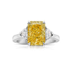 Elegant yellow radiant diamond ring featuring a GIA-certified fancy yellow diamond with VS2 clarity.