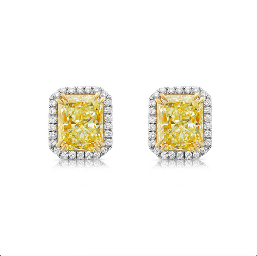Fancy 6 carat light yellow diamond earrings. Diamond earrings. Yellow diamond earrings. Yellow diamond studs. Yellow diamond jewelry.