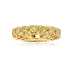 Fancy yellow diamond asscher cut eternity band. asscher cut diamonds. yellow asscher cut diamonds. Diamond eternity ring. Diamond wedding band. Yellow diamond jewelry. 