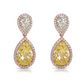 yellow diamond earrings. yellow diamond pear shape earrings.  yellow diamond drop earrings. diamond earrings.