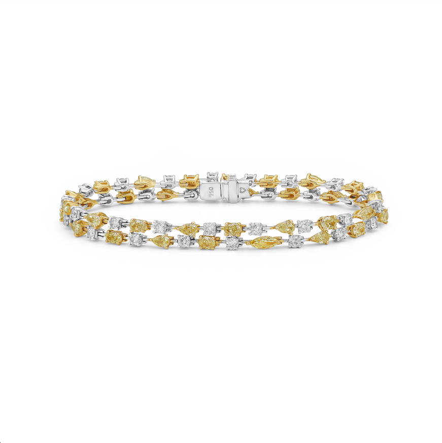7.70 Carat Fancy Intense Yellow Multi Shape  2.38 White Rounds  Set in 18k White Gold  Size 7 Wrist Ready to ship in 3-5 weeks