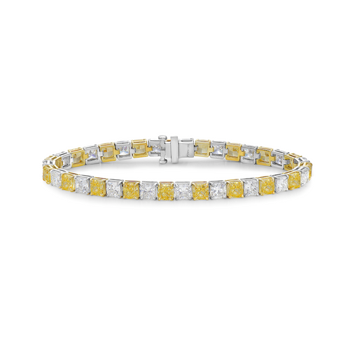 yellow diamond bracelet. tennis bracelet. alternating diamond bracelet. yellow diamond cushions