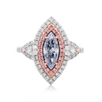 Fancy blue elongated diamond ring. blue marquis diamond. light blue diamond.