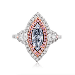 Fancy blue elongated diamond ring. blue marquis diamond. light blue diamond.
