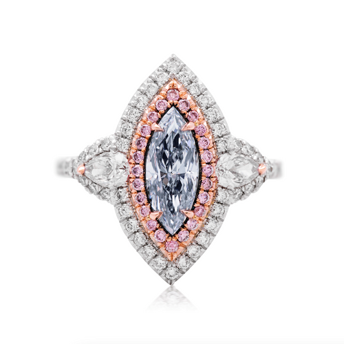 Fancy blue elongated diamond ring. blue marquis diamond. light blue diamond.