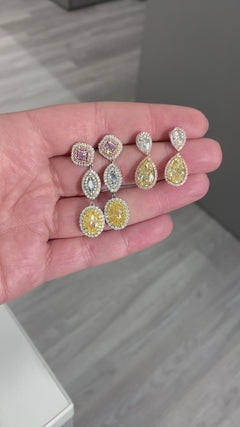 fancy colored diamonds. fancy colored diamond earrings. blue and pink diamonds. pink diamonds. blue diamonds. yellow diamonds. blue diamond earrings.