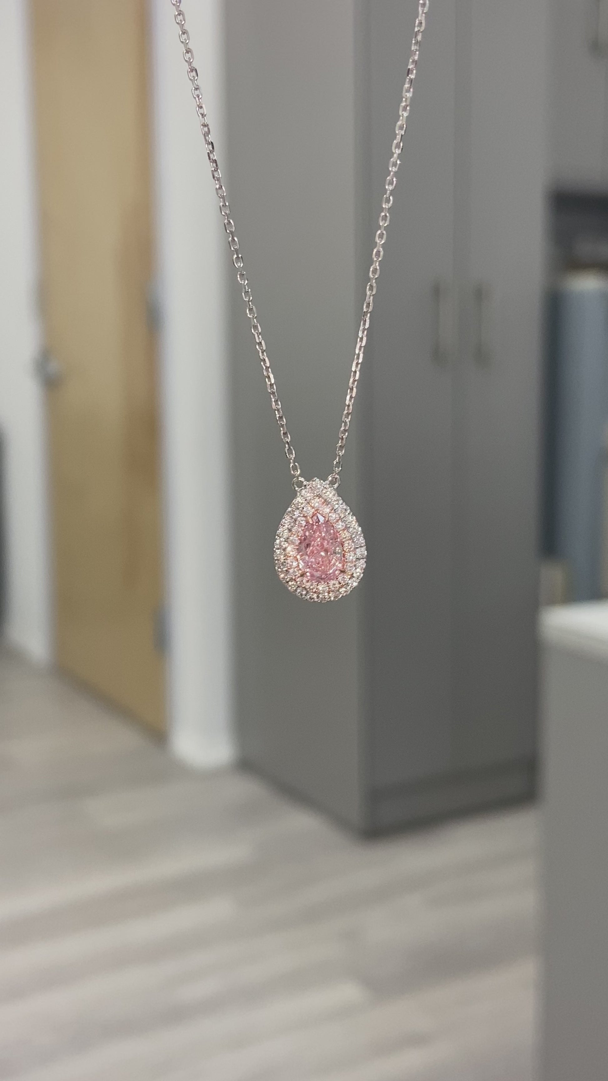 Pink diamond pendant. pink diamond necklace. light pink diamonds. light pink pear shape. diamond pendant. pear diamond pendant. 