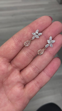 Light pink diamond earrings. Light pink earrings. Natural light pink diamond earrings. Gia certified light pink diamond earrings. Natural pink diamonds