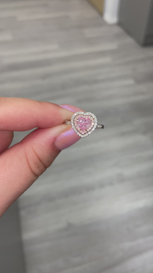 Pink diamond heart shape ring. 