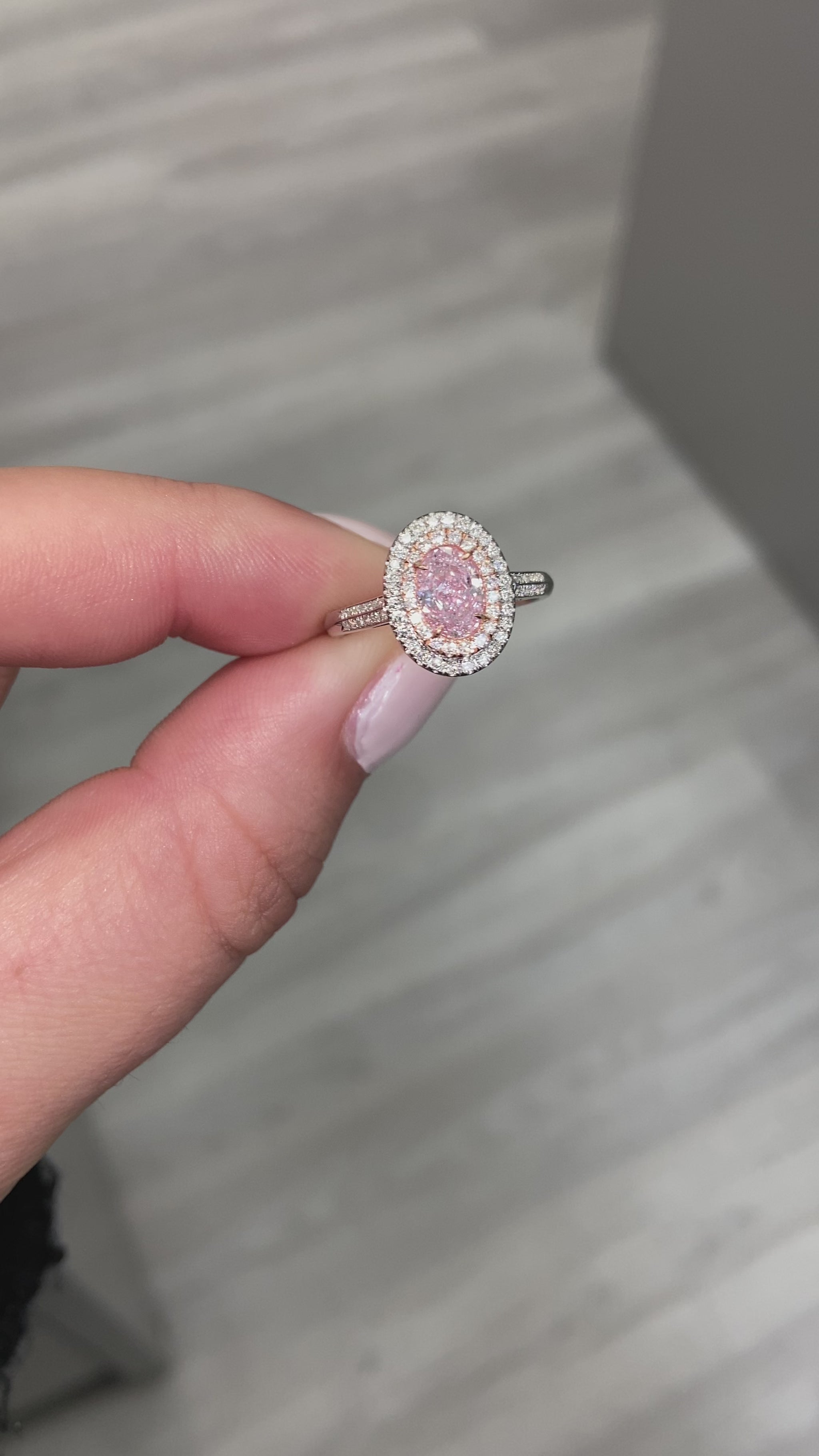 Pink diamond ring. pink diamond engagement ring. light pink diamonds. light pink oval diamond.  Unique engagement ring.