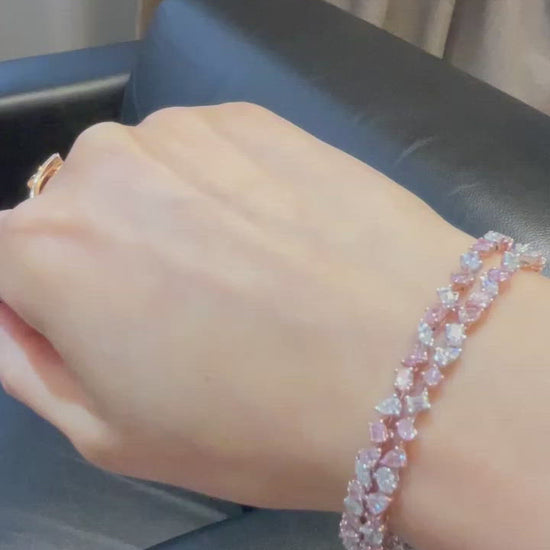Pink diamond bracelet. pink diamond pear shape bracelet. Pink tennis bracelet. Natural pink diamond bracelet. Multi row pink diamond bracelet. Pink diamond jewelry