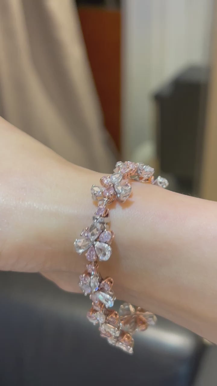 rare colors. pink diamond bracelet. pink floral bracelet. pink pear shape diamond. pink and white diamond bracelet. Natural pink diamond jewelry.