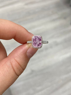 pink diamond ring. pink radiant cut diamond. light pink diamond