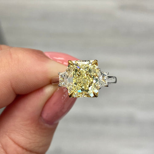 4 carat fancy yellow diamond ring. Gia certified fancy yellow diamond. Radiant cut yellow diamond. Yellow diamond engagement ring. Yellow diamond 3-stone ring. Canary diamond ring.