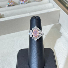 pink diamond ring. pink diamond oval. very light pink diamond