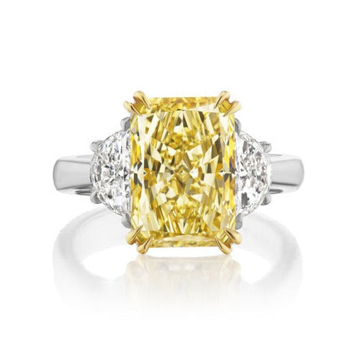Fancy light yellow elongated radiant cut diamond ring