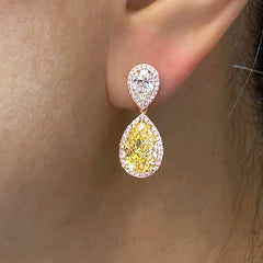 ar shape earrings.  yellow diamond drop earrings. diamond earrings.