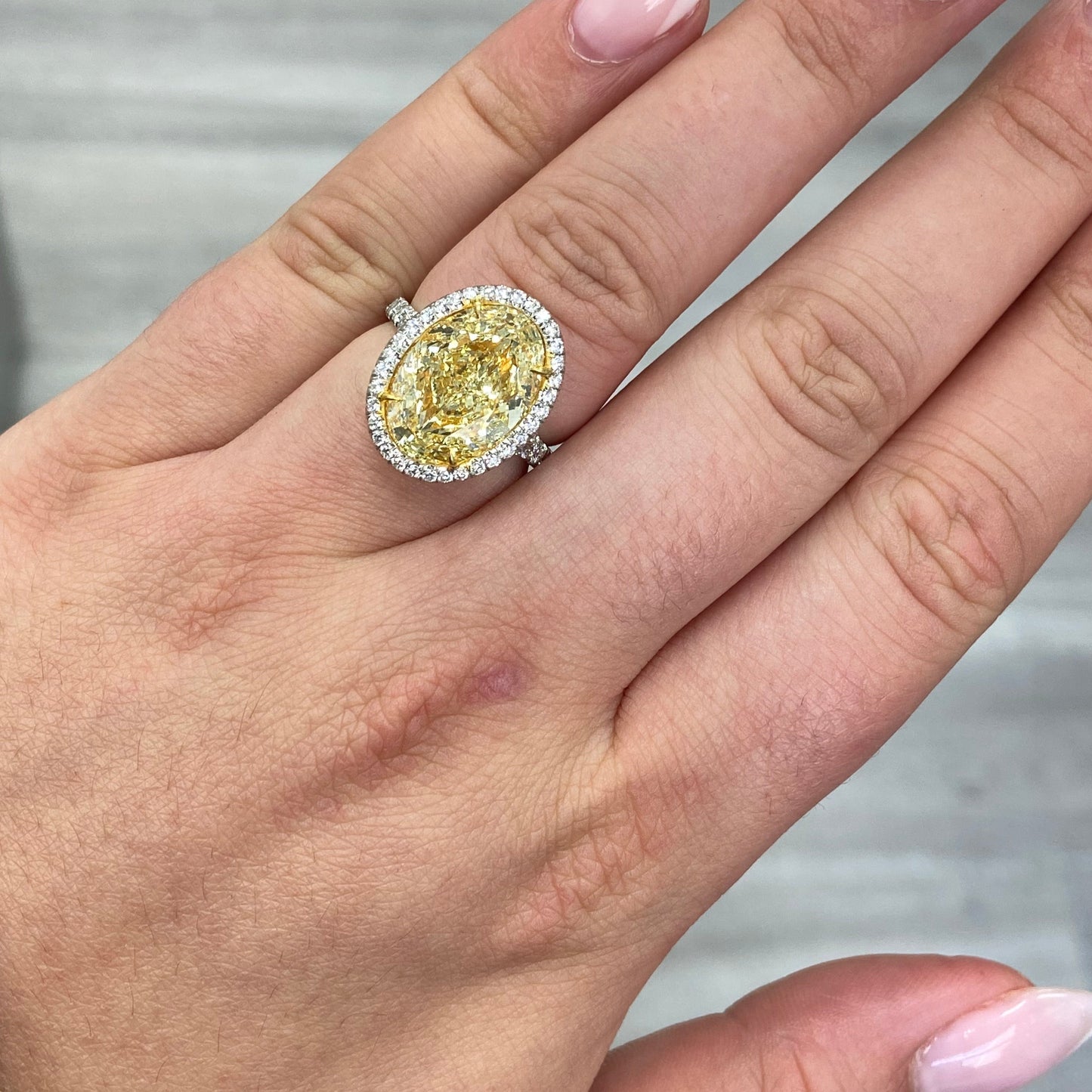 7 carat light yellow oval diamond ring